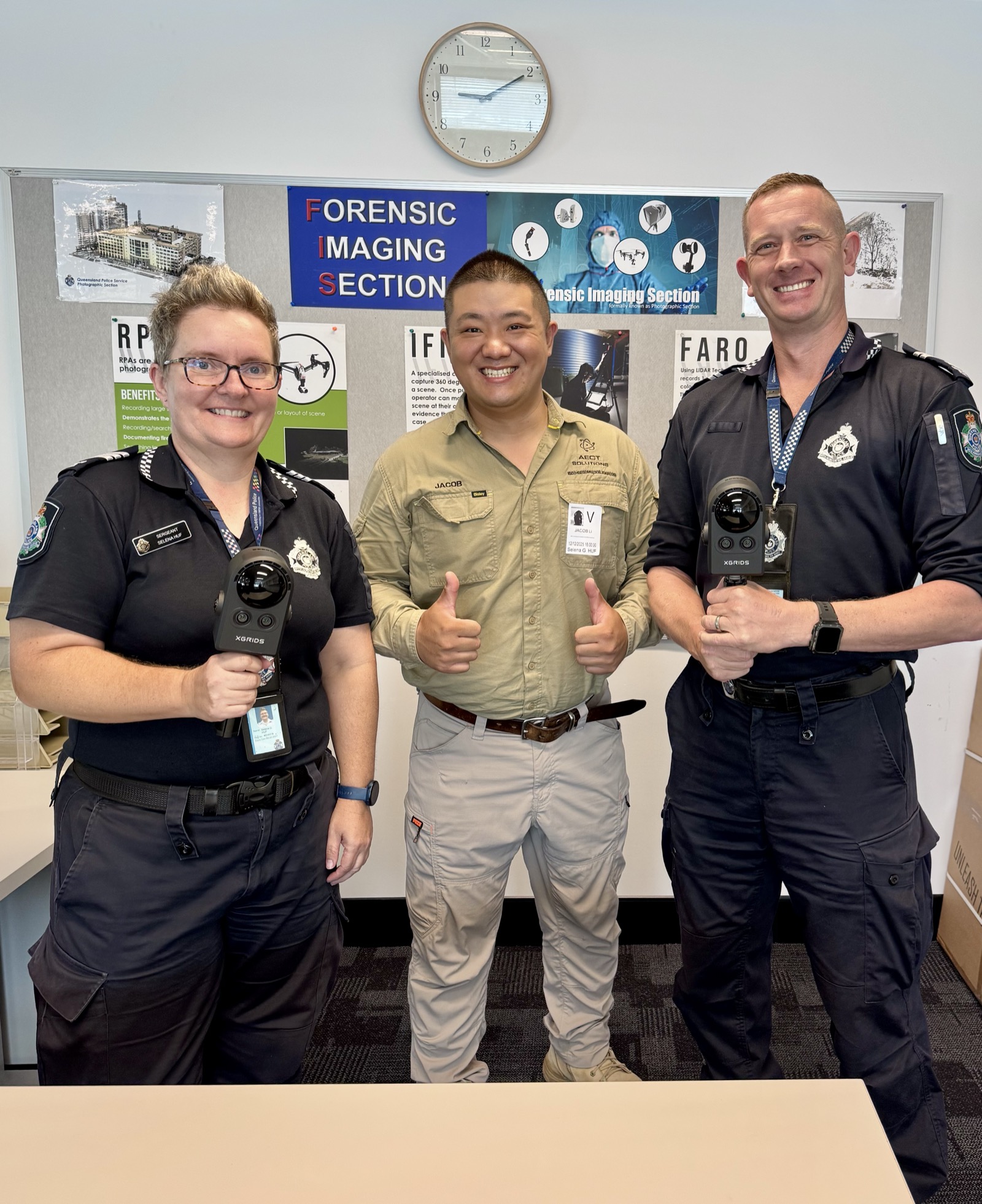 Law-enforcement team with XGRIDS scanners after training